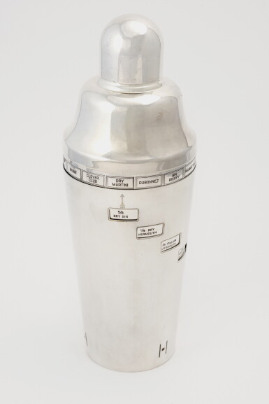 View full screen - View 1 of Lot 2. AN AMERICAN SILVER-PLATED "TELLS YOU HOW" COCKTAIL RECIPE SHAKER.