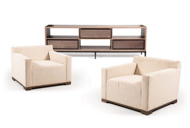 View full screen - View 1 of Lot 224. Christian Liaigre (1943-2020), A stained wood (probably sycamore) sideboard, "Asie" model; with a set of four cream fabric upholstered fauteuils on wood feet, model "Ecume".