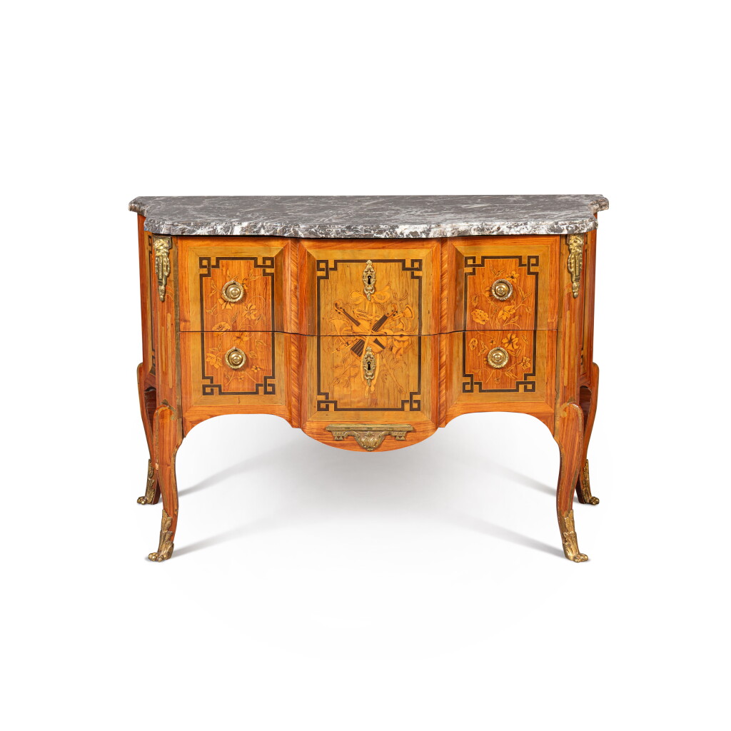 View full screen - View 1 of Lot 326. A Louis XV gilt-bronze mounted tulipwood, holly, barberry, amaranth, blackened pearwood commode, circa 1770, stamped by Gérard Peridiez.