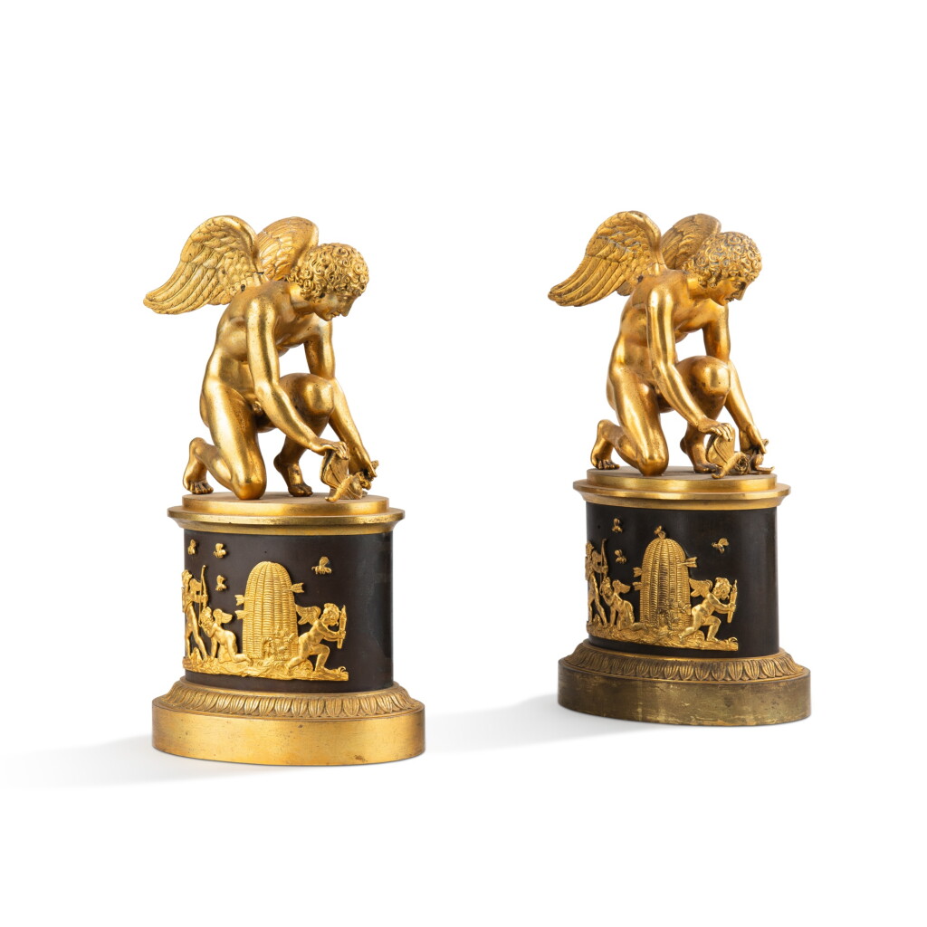 View full screen - View 1 of Lot 49. A pair of Empire gilt and patinated bronze statuettes, early 19th century, after Antoine-Denis Chaudet (1763-1810) | Paire de statuettes en bronze doré et patiné d'époque Empire, XIXe siècle, d'après Antoine-Denis Chaudet (1763-1810) .