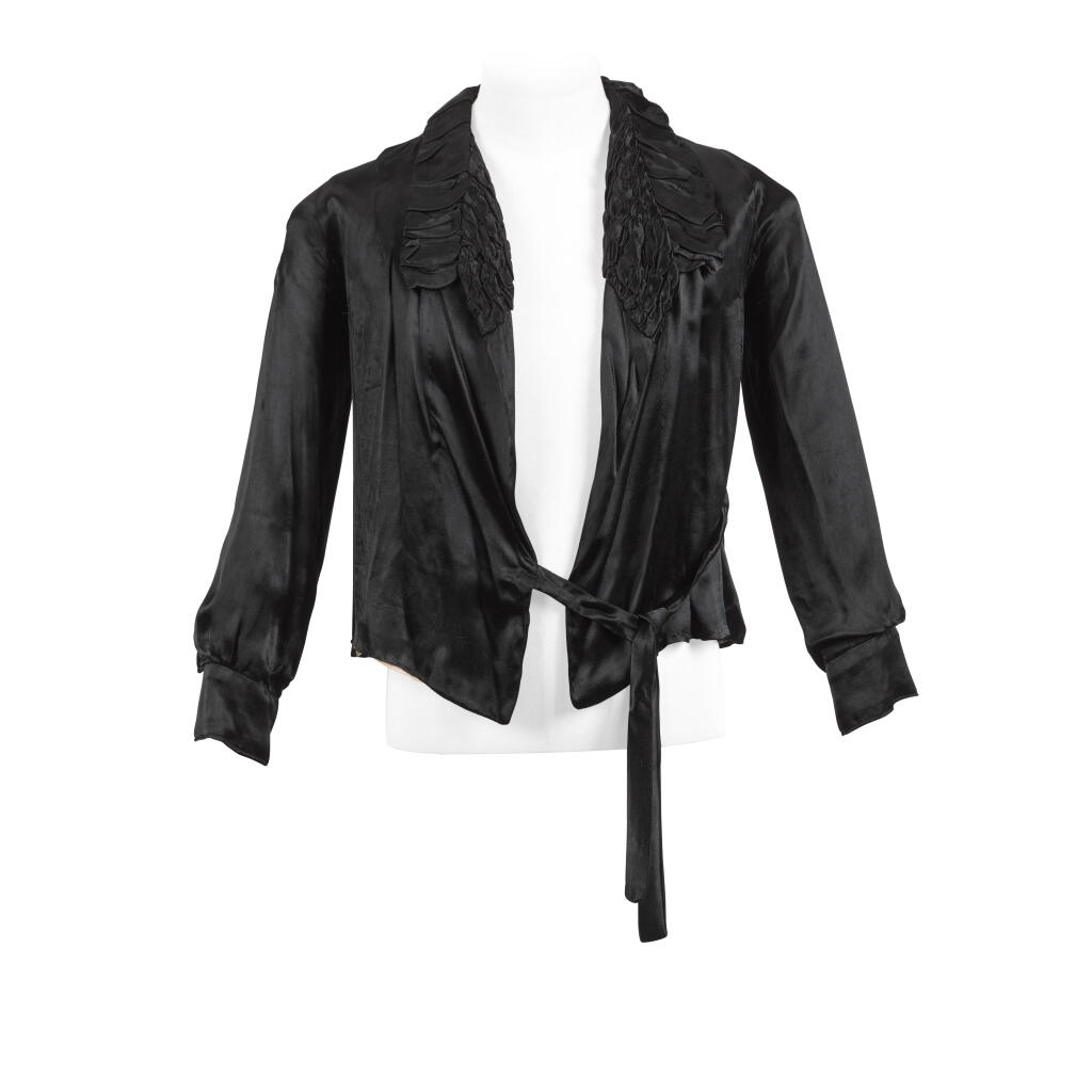 View full screen - View 1 of Lot 167. Freddie Mercury's black satin jacket and trousers, worn at a photoshoot and press reception, 1974 - 1976.