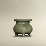 A Junyao celadon-glazed tripod incense burner, Jin dynasty | 金 鈞窰青釉三足爐