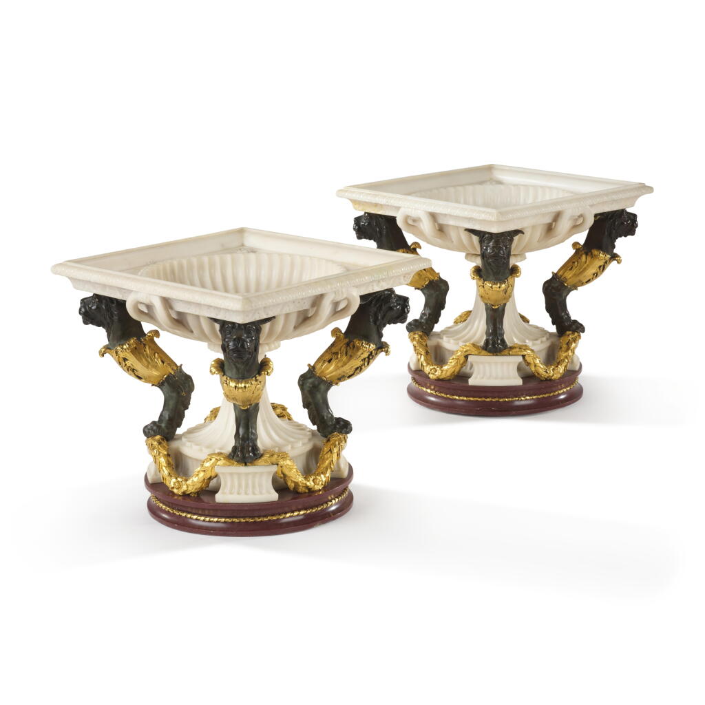 View full screen - View 1 of Lot 37. A pair of Italian patinated and gilt-bronze mounted white marble tazze, Rome, circa 1790, by Giuseppe Valadier (1762-1839).