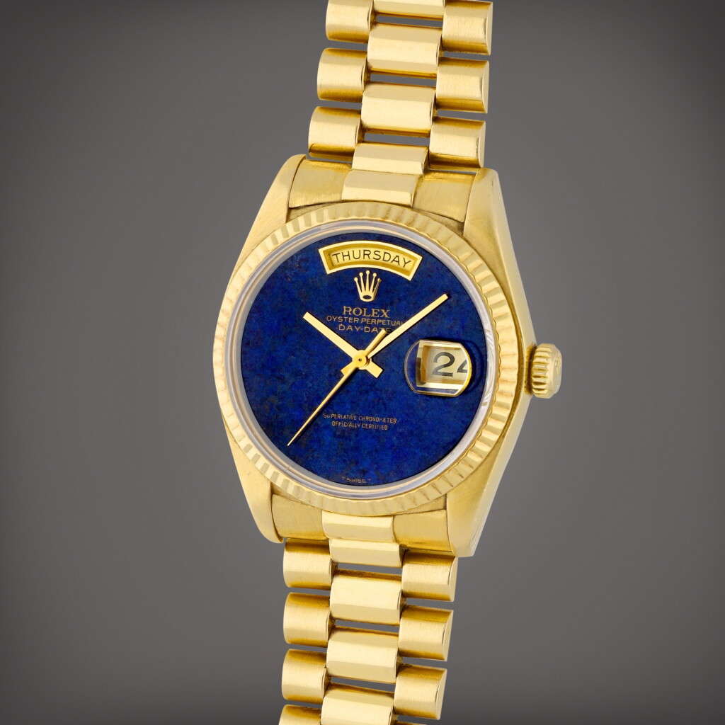 View full screen - View 1 of Lot 49. Day-Date, Reference 18038 A yellow gold wristwatch with day, date, lapis lazuli dial and bracelet Circa 1996.