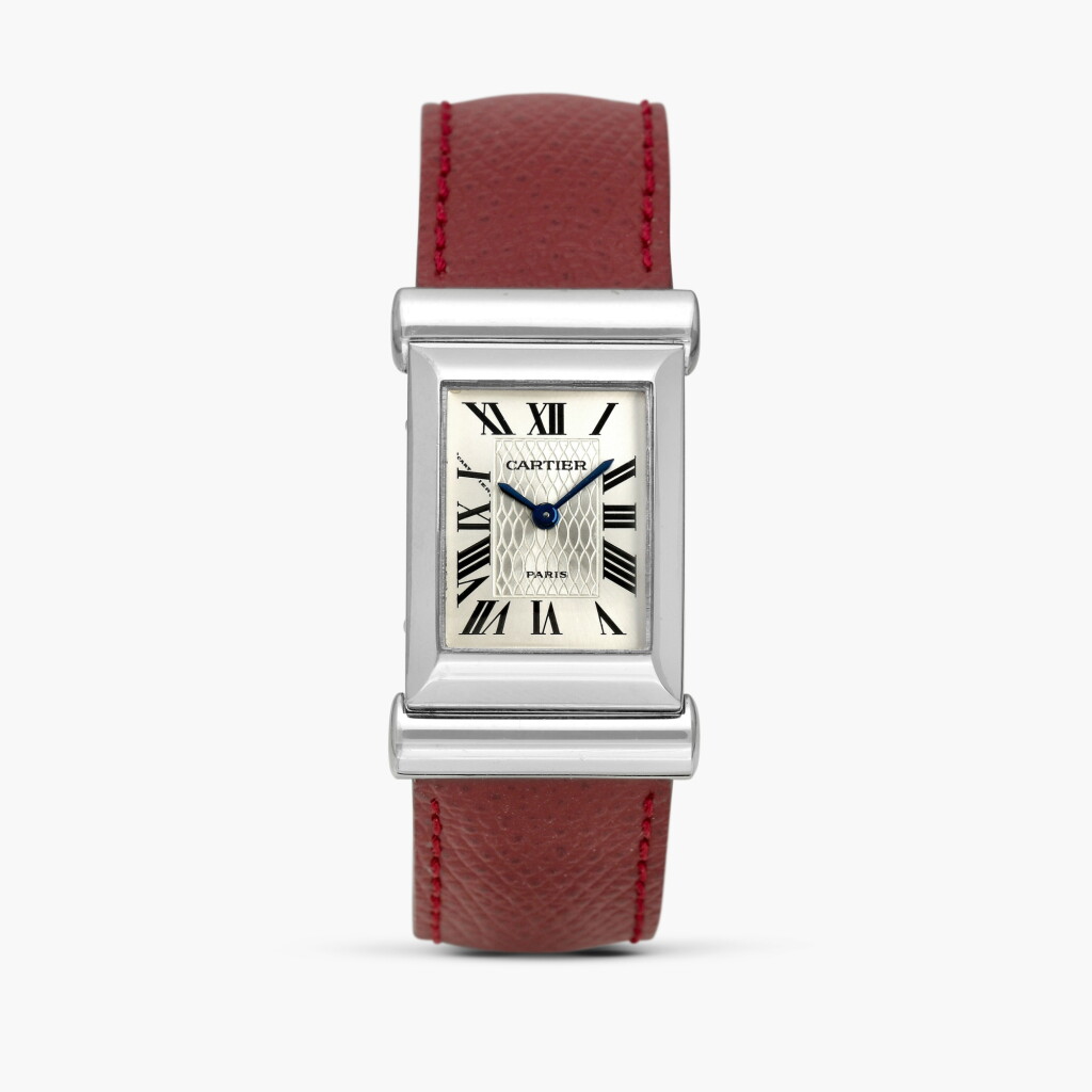 View full screen - View 1 of Lot 2223. Pilote / Driver | An unusual limited edition, deeply curved rectangular white gold driver’s rear-wound wristwatch with integrated white gold deployant buckle, Circa 1998.