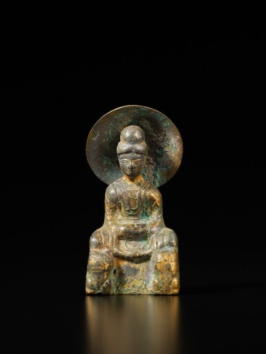 View full screen - View 1 of Lot 167. A gilt-bronze seated figure of Shakyamuni Buddha, Sixteen Kingdoms Period.