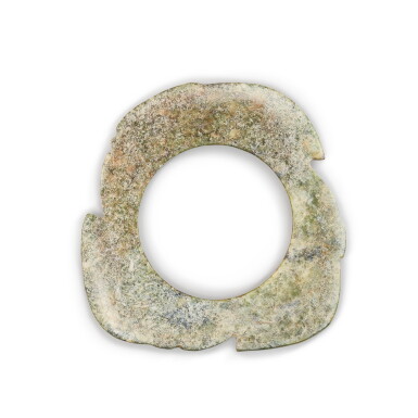 View full screen - View 1 of Lot 228. An archaic greenish-grey jade notched disc (Xuanji), Neolithic period | 新石器時代 玉璇璣.