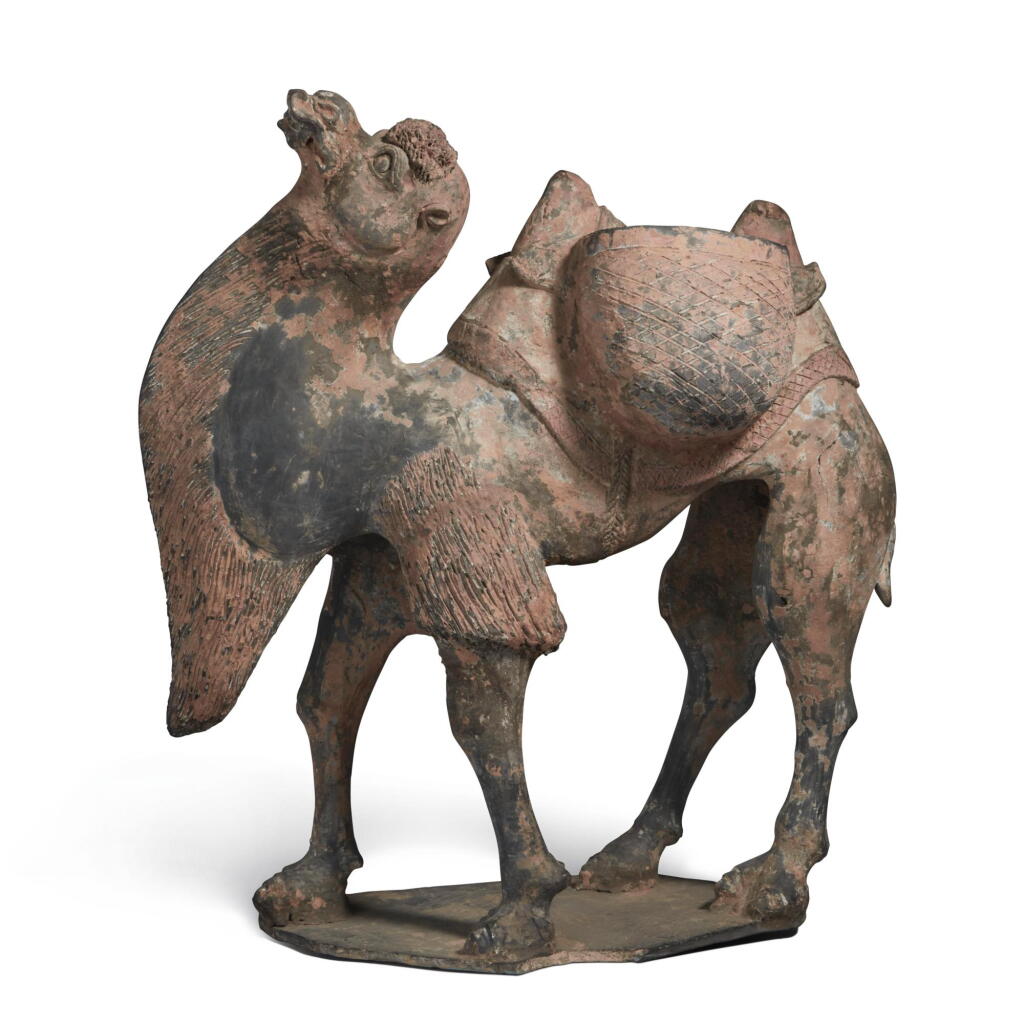 View full screen - View 1 of Lot 794. A painted gray pottery figure of a Bactrian camel, Early Tang dynasty | 唐初 灰陶加彩駱駝.