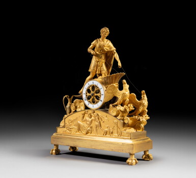 View full screen - View 1 of Lot 251. A gilt-bronze mantel clock, Empire, circa 1810 Pendule au char d'Apollon en bronze doré d'époque Empire, vers 1810.
