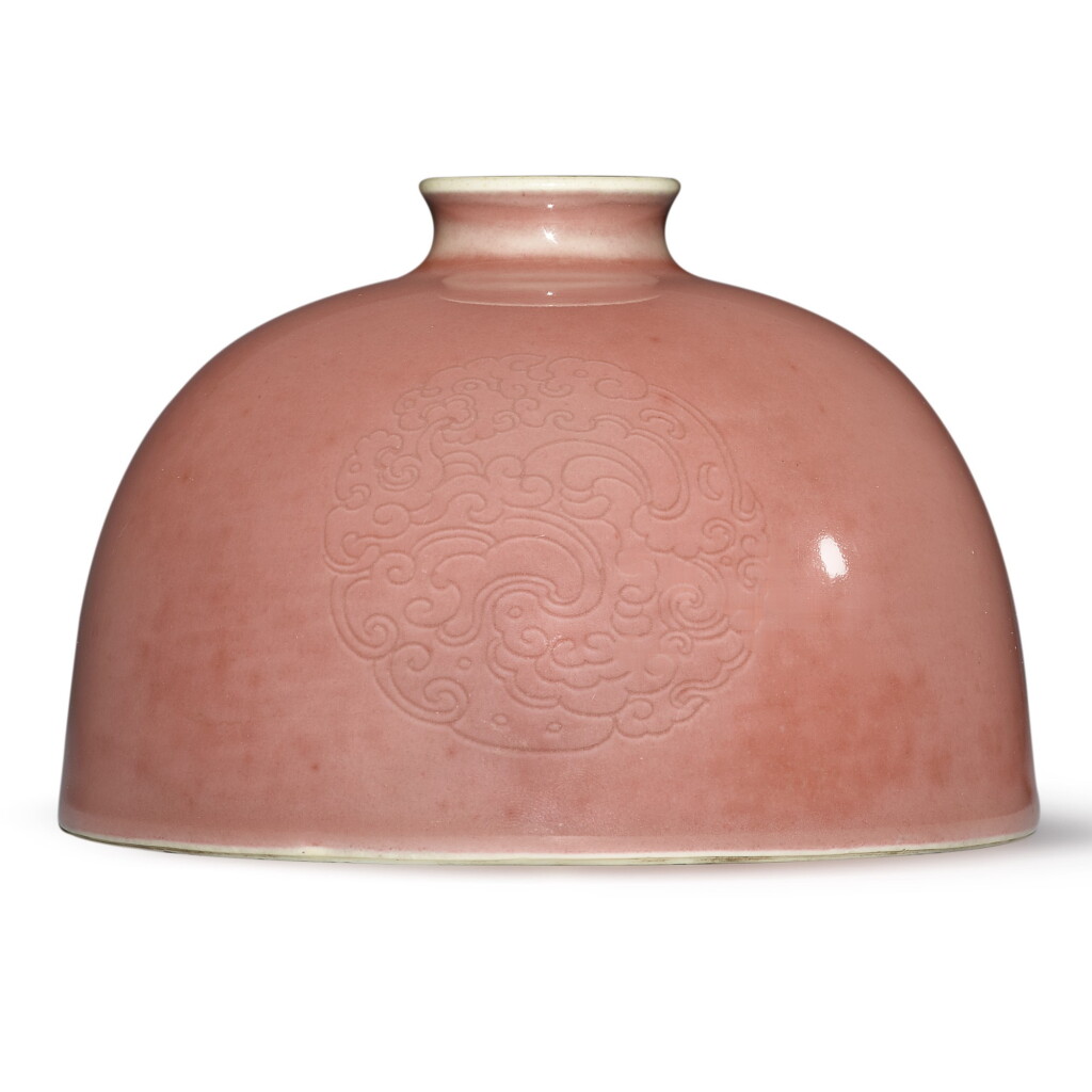 View full screen - View 1 of Lot 136. A peachbloom-glazed 'beehive' waterpot, Kangxi mark and period | 清康熙 豇豆紅釉團龍紋太白尊 《大清康熙年製》款.