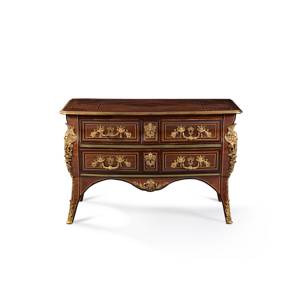 View full screen - View 1 of Lot 33. An early Louis XV gilt-bronze mounted Indian ebony, amaranth and holly commode, circa 1730.
