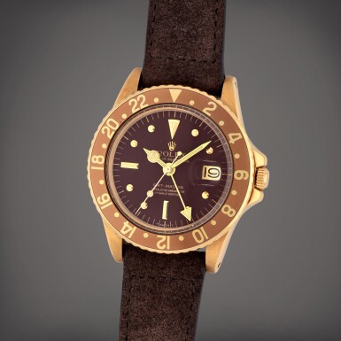 View full screen - View 1 of Lot 70. GMT-Master 'Nipple Dial', Reference 1675 A yellow gold dual time zone wristwatch with date Circa 1972.