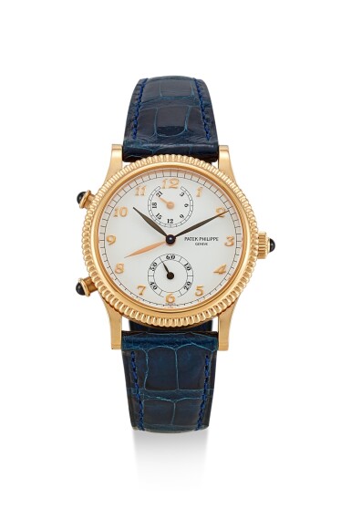 View full screen - View 1 of Lot 8233. PATEK PHILIPPE | TRAVEL TIME, REFERENCE 4864, A PINK GOLD DUAL TIME ZONE WRISTWATCH WITH 24 HOURS INDICATION, CIRCA 2005.