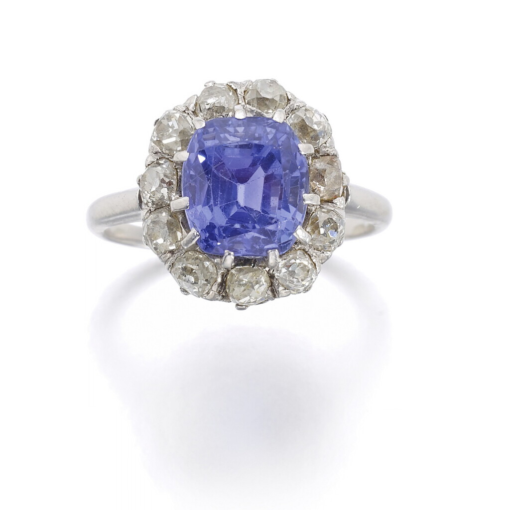 View full screen - View 1 of Lot 557. PURPLE SAPPHIRE AND DIAMOND RING.