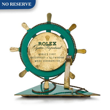 View full screen - View 1 of Lot 8064. ROLEX | OYSTER PERPETUAL A GILT BRASS AND GREEN ENAMEL RETAILER'S WINDOW DISPLAY, CIRCA 1960.