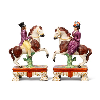 View full screen - View 1 of Lot 215. A Rare Pair of Staffordshire Pottery Figures of Equestrians, Circa 1820-30.