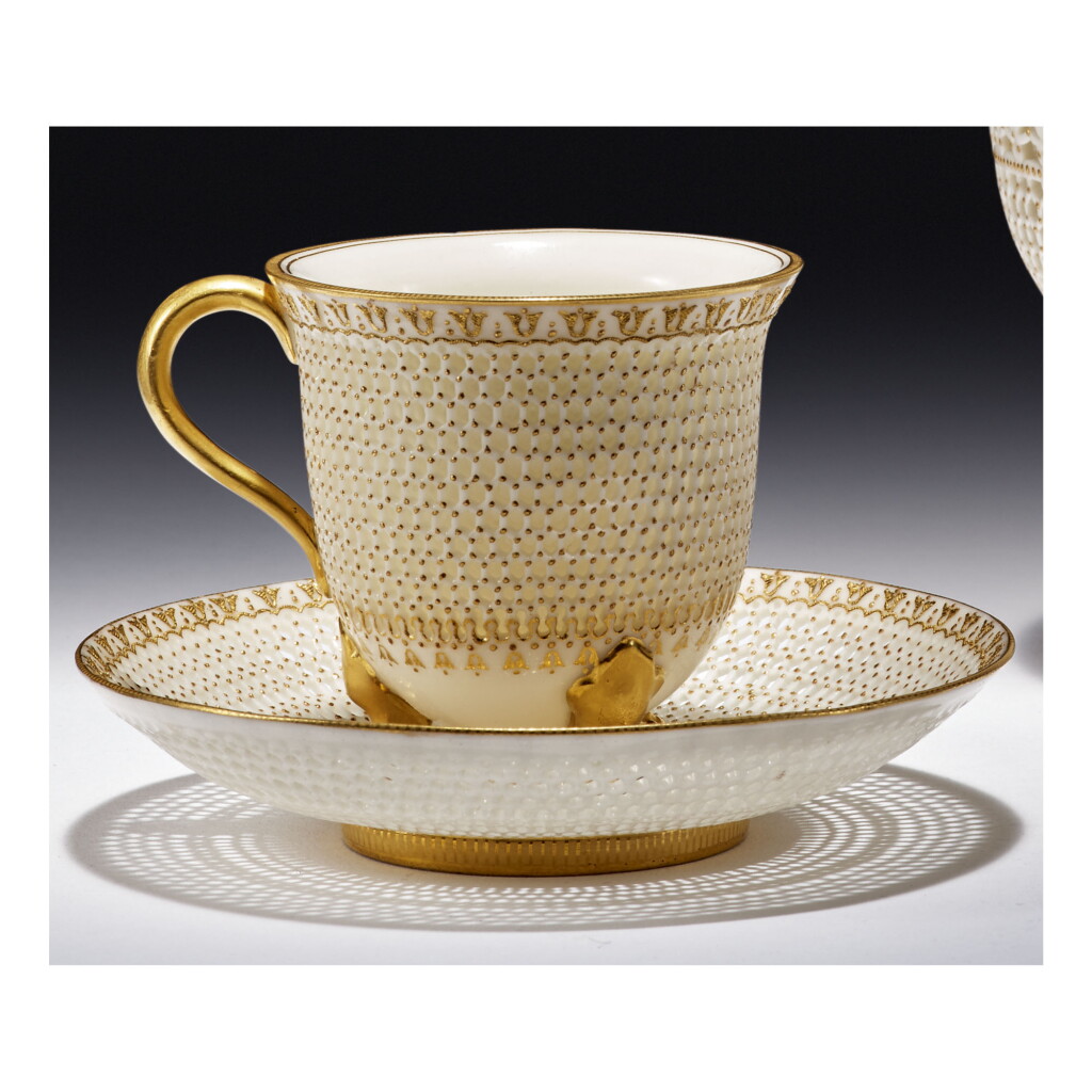 View full screen - View 1 of Lot 195. A ROYAL WORCESTER RETICULATED PORCELAIN DOUBLE-WALLED CABINET CUP AND STAND BY GEORGE OWEN 1924.