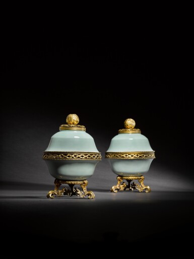 View full screen - View 1 of Lot 70. A pair of early Louis XV gilt-bronze and gilt-metal-mounted Chinese celadon-ground pot-pourri bowl and covers, the porcelain Qianlong mark and period.