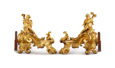 View full screen - View 1 of Lot 136. A pair of gilt-bronze firedogs, French Régence style, 19th century | Paire de chenets en bronze doré de style Régence, XIXe siècle.