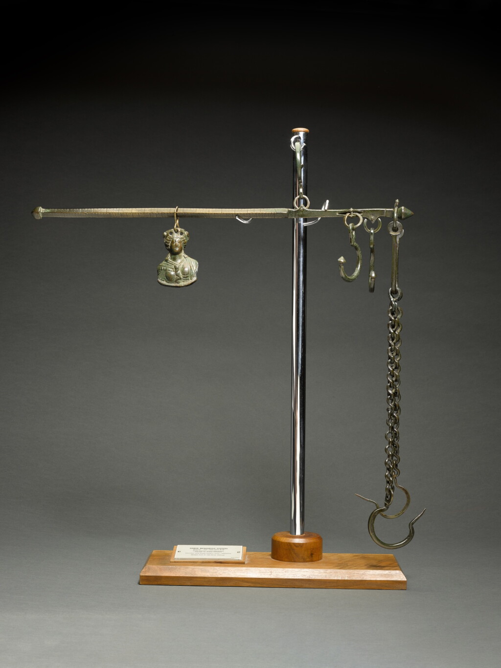 View full screen - View 1 of Lot 451. A Late Roman Bronze Steelyard and Weight, circa 3rd/4th Century A.D..
