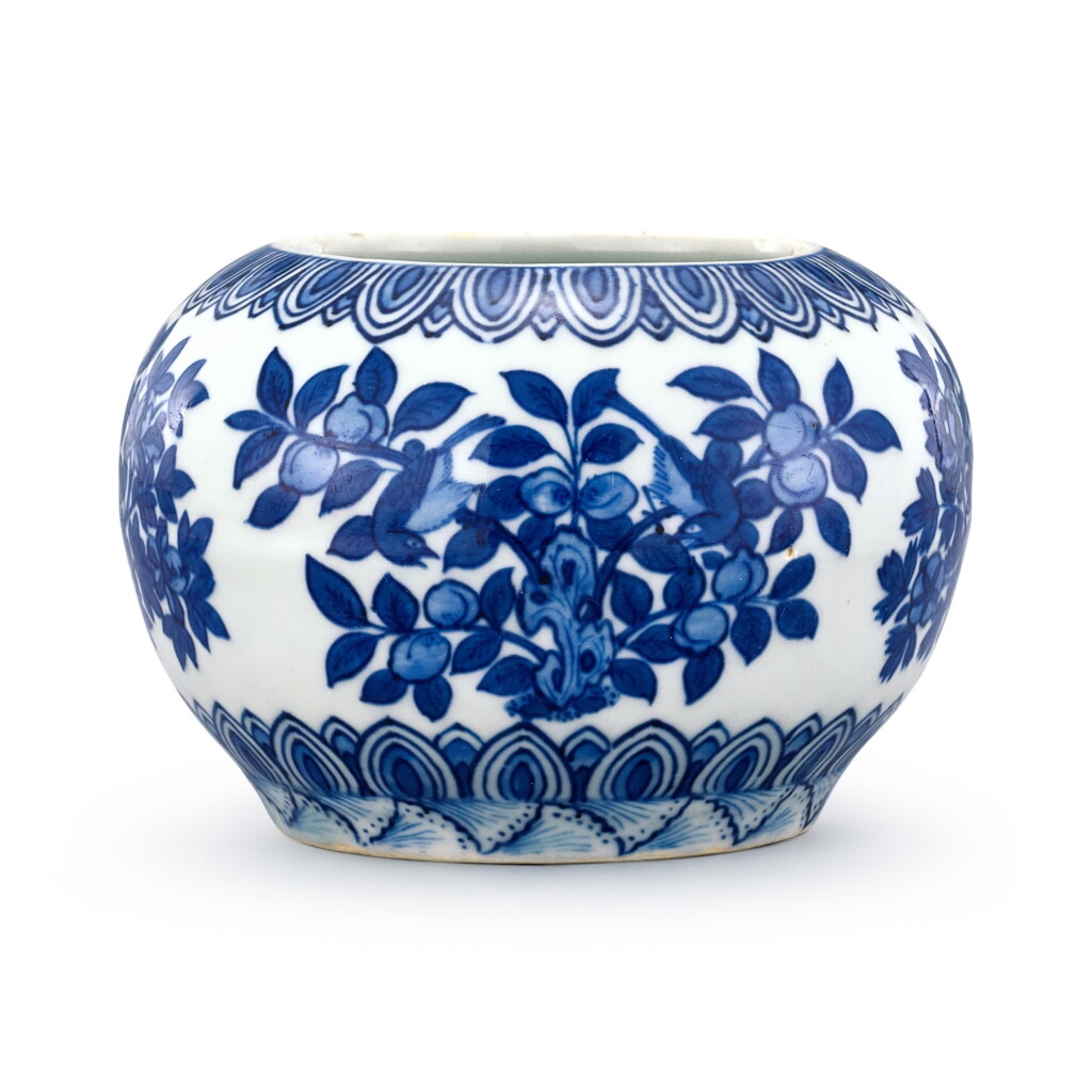 View full screen - View 1 of Lot 331. A blue and white 'peach and pomegranate' jar Mark and period of Wanli | 明萬曆 青花折枝瑞果紋罐 《大明萬曆年製》款.