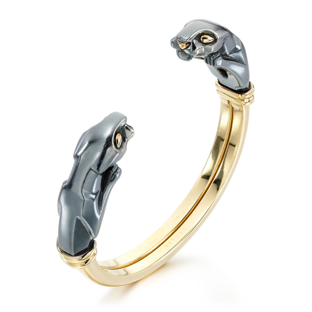 View full screen - View 1 of Lot 54. Cartier | Gold bangle, 'Panthère'.