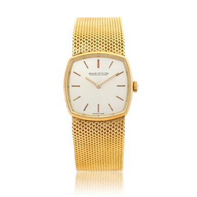 View full screen - View 1 of Lot 21. A yellow gold cushion shaped bracelet watch, Circa 1980.