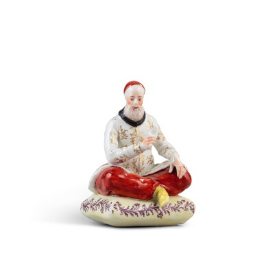 View full screen - View 1 of Lot 791. A Vienna porcelain figure of a seated Turkish man drinking coffee, circa 1770.