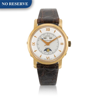View full screen - View 1 of Lot 89. Pink Gold Triple Calendar Wristwatch With Moon-Phases Circa 1950.