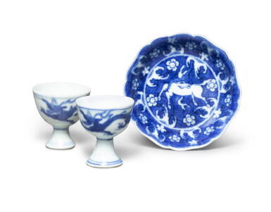 View full screen - View 1 of Lot 154. A small blue and white 'celestial horse' saucer and two blue and white small 'dragon' stemcups Qing dynasty, 17th century | 清十七世紀 青花小盤 《大明宣德年製》仿款及高足小盃一組三件.