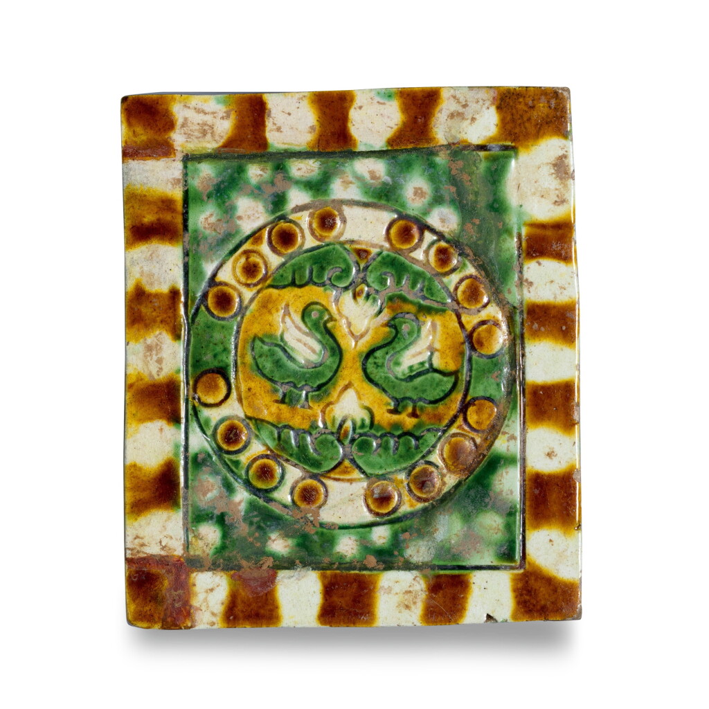 View full screen - View 1 of Lot 7. A sancai-glazed 'mandarin ducks' pillow, Tang dynasty.