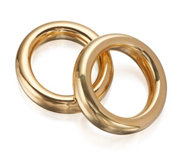 View full screen - View 1 of Lot 2. PAIR OF GOLD 'CIEMBELLA' BANGLE-BRACELETS, ELSA PERETTI FOR TIFFANY & CO..