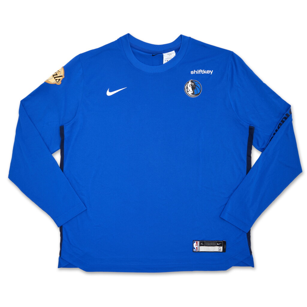 View full screen - View 1 of Lot 47. Dereck Lively II Dallas Mavericks 2024 NBA Finals Game Worn Long Sleeve Shooting Shirt | Game 5.