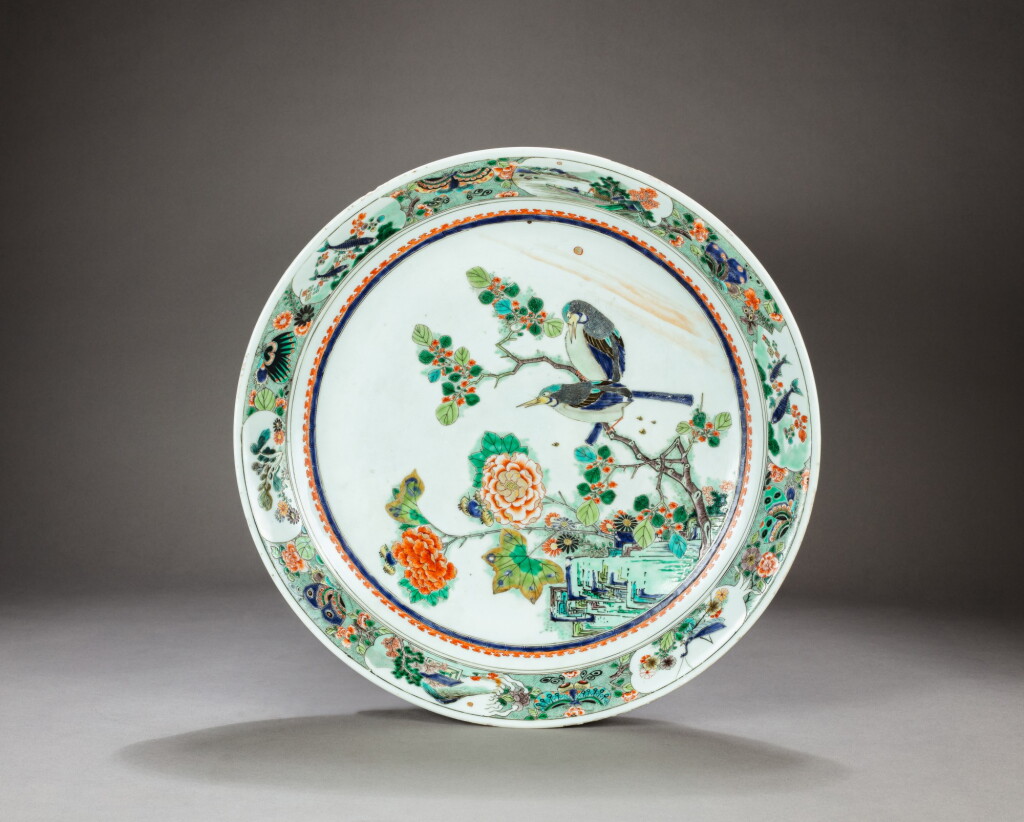 View full screen - View 1 of Lot 181. A large famille-verte 'flower and bird' dish Qing dynasty, Kangxi period | 清康熙 五彩花鳥纹盤.