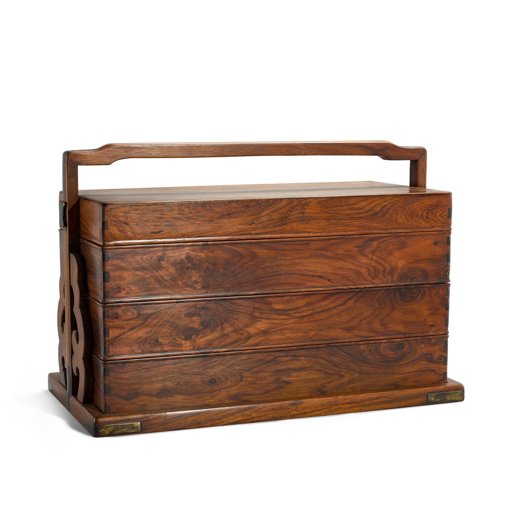 View full screen - View 1 of Lot 377. A huanghuali three-tier carry box and cover, Qing dynasty, 17th - 18th century | 清十七至十八世紀 黃花梨三層提盒.