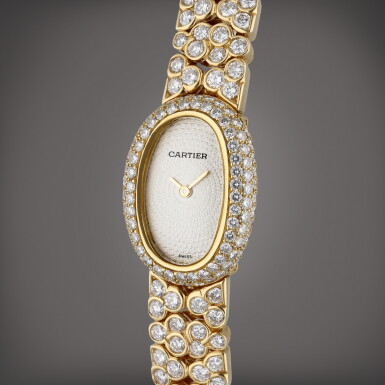 View full screen - View 1 of Lot 80. Baignoire | A yellow gold and diamond-set wristwatch with bracelet, Circa 2005.