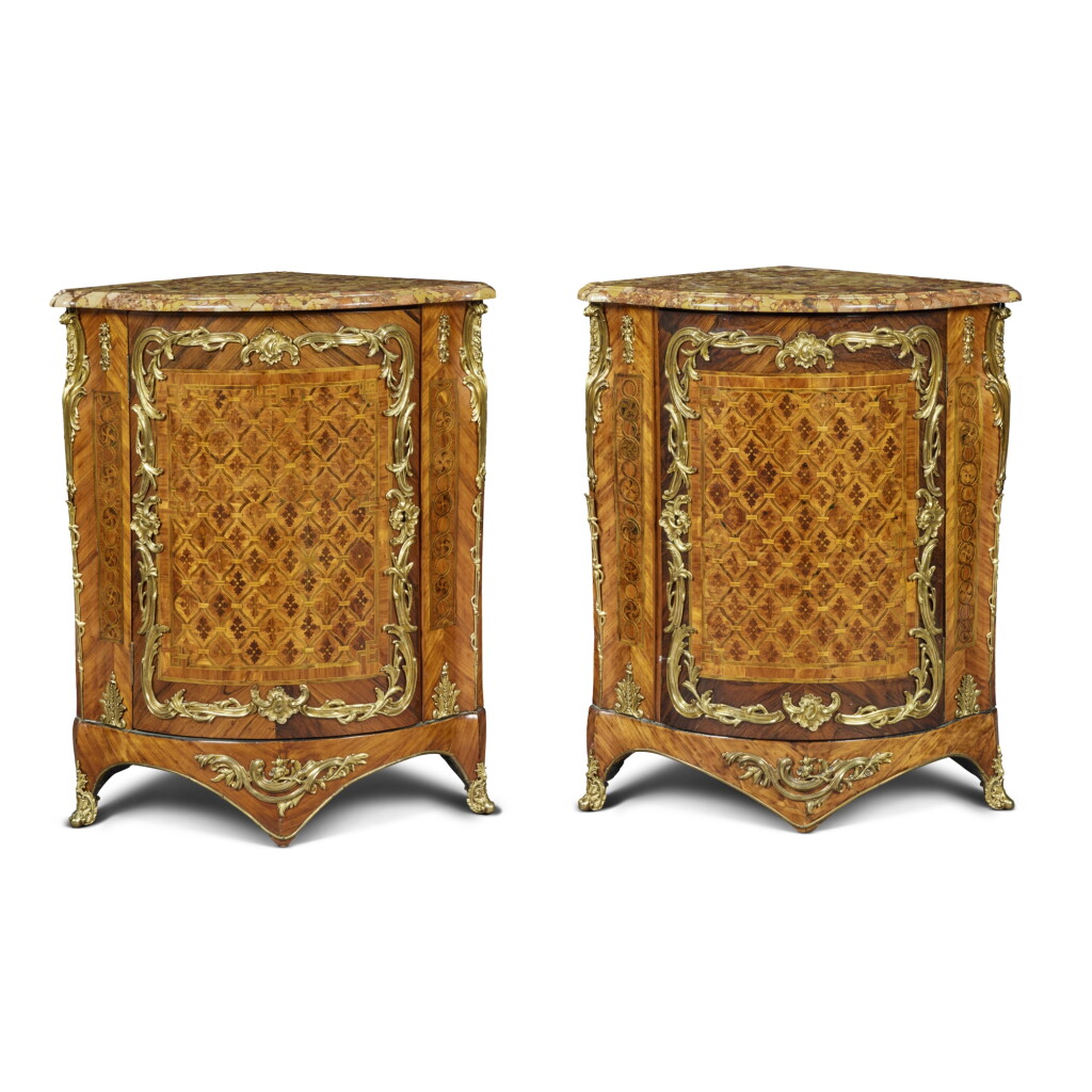 View full screen - View 1 of Lot 334. A Pair of Louis XV Gilt-Bronze Mounted Kingwood, Tulipwood, Amaranth and Stained Sycamore Parquetry Encoignures by Pierre-Antoine Foullet, Mid-18th Century.