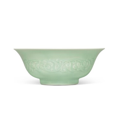 View full screen - View 1 of Lot 131. A fine and rare celadon-glazed 'floral' bowl, Mark and period of Yongzheng | 清雍正 粉青釉淺浮雕纏枝花卉紋盌 《大清雍正年製》款.
