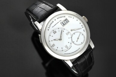 View full screen - View 1 of Lot 76. Reference 101.049 Lange 1 Cellini A limited edition platinum wristwatch with date and power reserve indication, made to commemorate the 25th anniversary of Cellini in 2002.