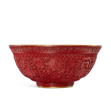 View full screen - View 1 of Lot 3718. A carved cinnabar-lacquered and turquoise-glazed 'longevity' porcelain bowl, Seal mark and period of Qianlong | 清乾隆 瓷胎剔紅「萬壽無疆」盌 《大清乾隆年製》款.