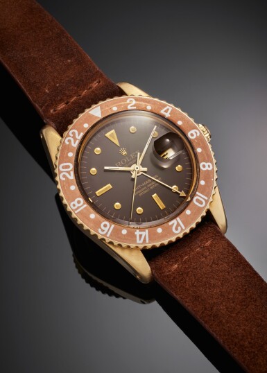 View full screen - View 1 of Lot 39. Reference 1675 GMT-Master 'Root Beer' | A yellow gold automatic dual time wristwatch with date, Circa 1966.