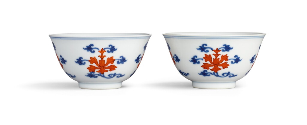 View full screen - View 1 of Lot 3617. A fine pair of underglaze-blue and iron-red 'lotus' cups Seal marks and period of Qianlong | 清乾隆 青花礬紅折枝番蓮紋盃一對 《大清乾隆年製》款.