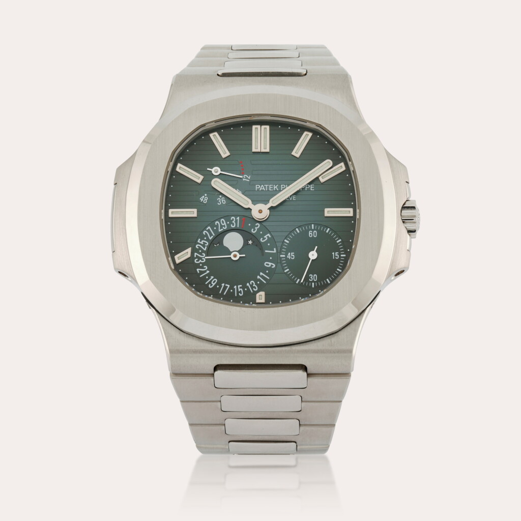 View full screen - View 1 of Lot 238. Nautilus, Reference 5712 | A stainless steel wristwatch with date, moon phases, power reserve indication and bracelet | Circa 2007.