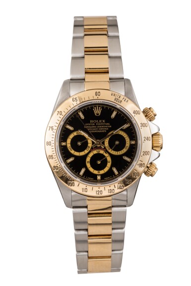 View full screen - View 1 of Lot 4. ROLEX | Daytona, Ref 16523 A Stainless Steel and Yellow Gold Chronograph Wristwatch with Bracelet Circa 1996.