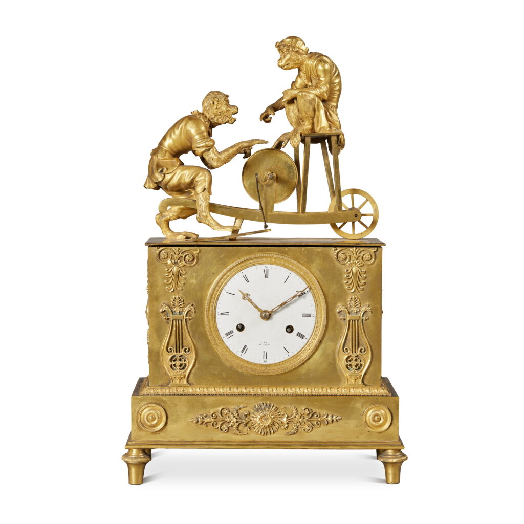 View full screen - View 1 of Lot 546. An Empire Gilt-Bronze Figural Mantel Clock, Circa 1810.
