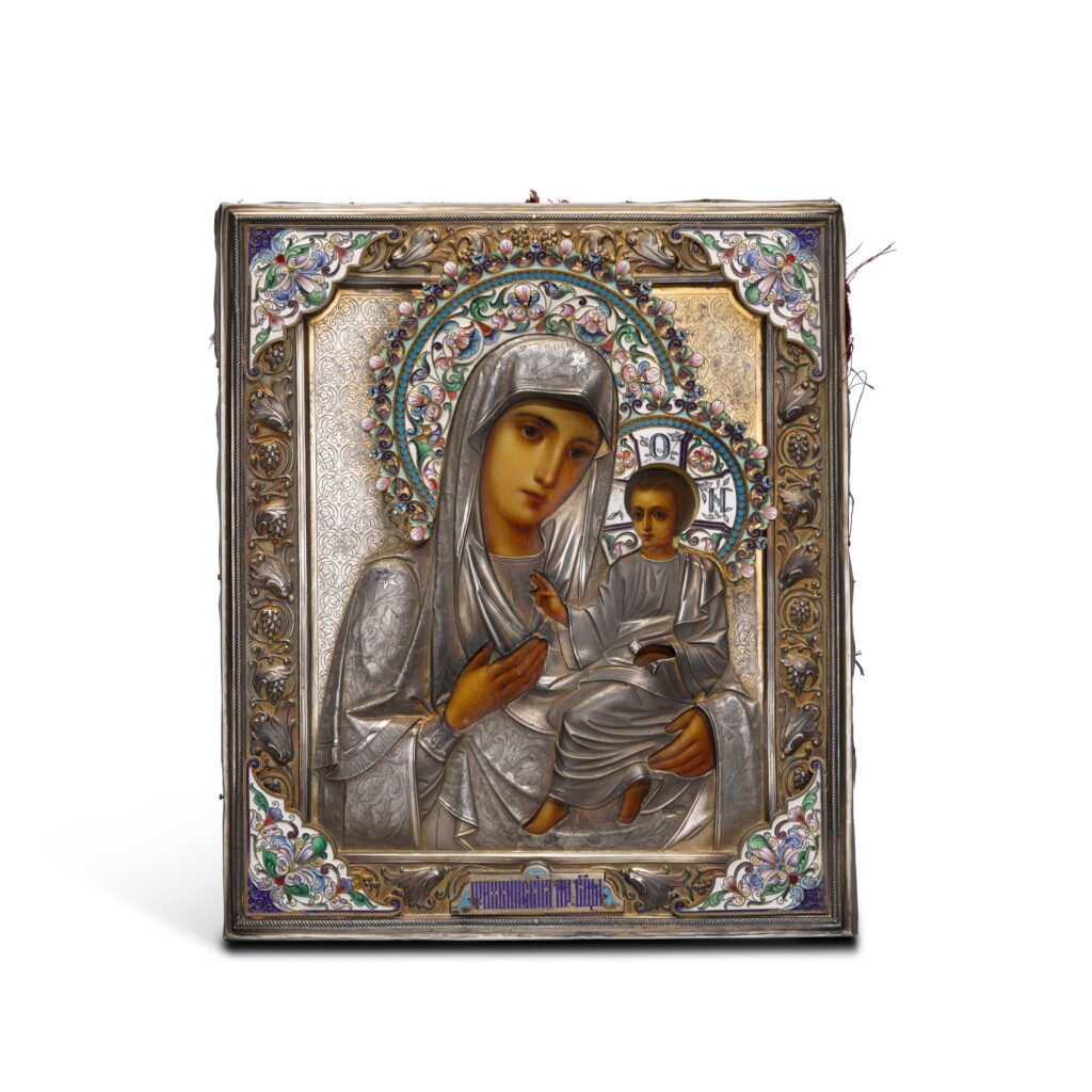 View full screen - View 1 of Lot 315. A silver-gilt and cloisonné enamel icon of the Tikhvin Mother of God, 1st Moscow Artel, Moscow, 1908-1917.