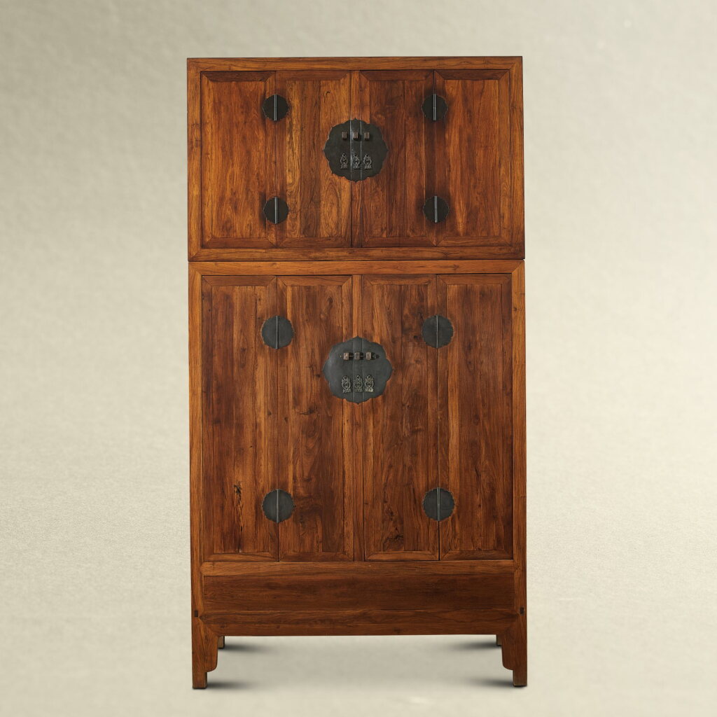 View full screen - View 1 of Lot 5711. A massive huanghuali-veneered compound warrior chest, Qing dynasty, 19th century | 清十九世紀 貼皮黃花梨四件櫃.