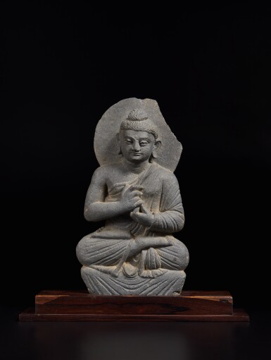 View full screen - View 1 of Lot 828. A gray schist figure of Shakyamuni Buddha, Ancient region of Gandhara, 3rd / 4th century.