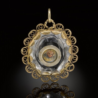 View full screen - View 1 of Lot 44. Spanish, 17th century | Rock crystal pendant with miniature of a cherub.