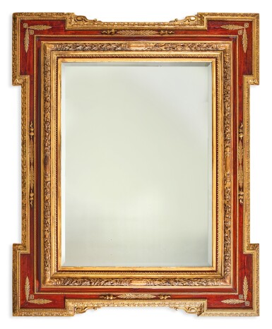 View full screen - View 1 of Lot 253. A LARGE BAROQUE STYLE PARCEL GILT CARVED AND STAINED WOOD FRAME, NOW MOUNTED AS A MIRROR.